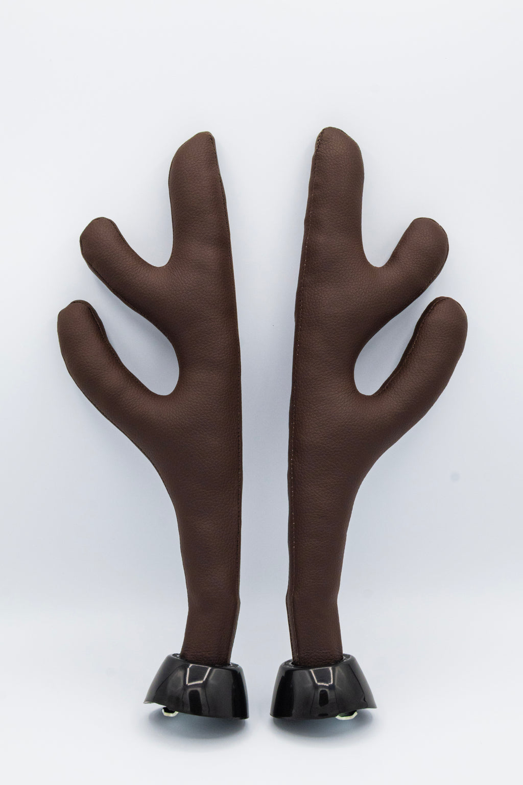 A pair of deer antlers for Tesla car with a white background. 